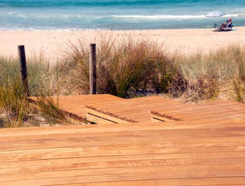 Photo of Vitex decking with steps leading directly on to sand dunes